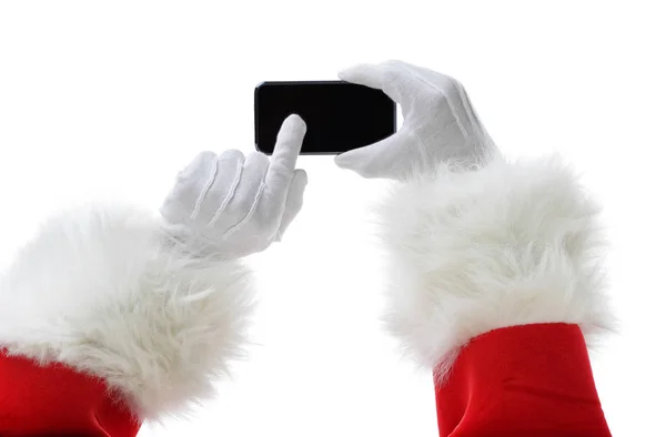 Vánoční koncept střílel s Santa držící black chytrý telefon, ukazující do kamery — Stock fotografie
