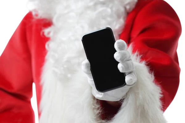 Karácsonyi concept shot télapó gazdaság egy fekete szúró telefon, mutatja, hogy a kamerába — Stock Fotó