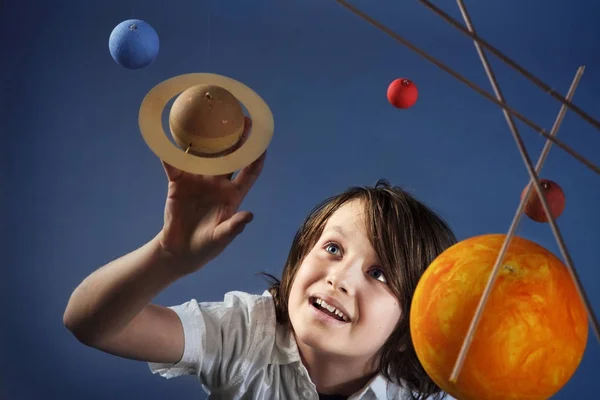 Kids and Science, self made Solar System Project - Studio shots with Young happy Boy — Stock Photo, Image