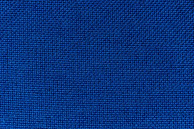 Close-up detailed bright dark blue fabrics textile texture background
