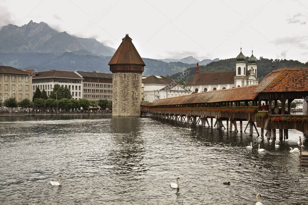 Kapellbrucke - Chapel Bridge over Reussin in Lucerne. Switzerland