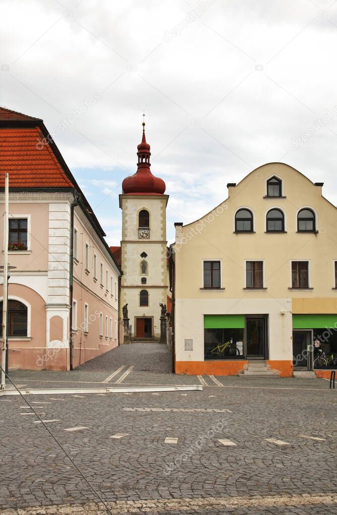 Upper Square - Horni namesti and church of St. Bartholomew Apostle in Hradek nad Nisou. Czech Republic