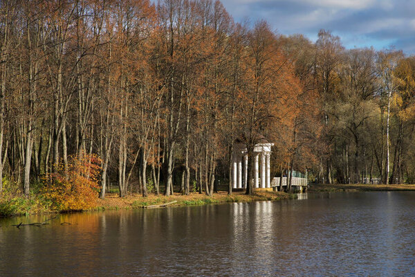 Pavilion on bank of Desna river and pedestrian bridge near Troitsk town - Troitsky administrative okrug of federal city of Moscow. Russia
