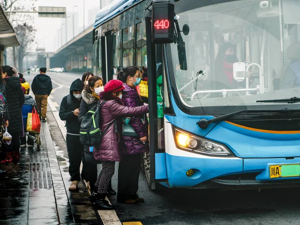 CHINA,CHENGDU,Yinghui Rd.-JANUARY 23,2020: Coronavirus epidemic in China .People wearing face masks.