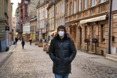 ITALY,MILAN,-MARCH 08,2020: Coronavirus epidemic in Italy. Italian man wearing face masks.