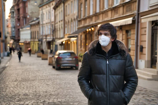 ITALY,MILAN,-MARCH 08,2020: Coronavirus epidemic in Italy. Italian man wearing face masks.
