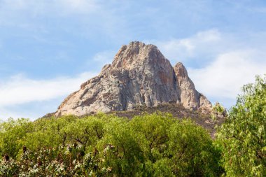 The rock of Pena de Bernal. clipart