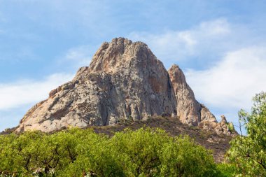 The rock of Pena de Bernal. clipart