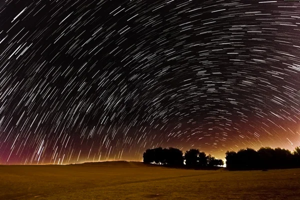 Star trails and meteors over the Israel Negev desert — Stock Photo, Image