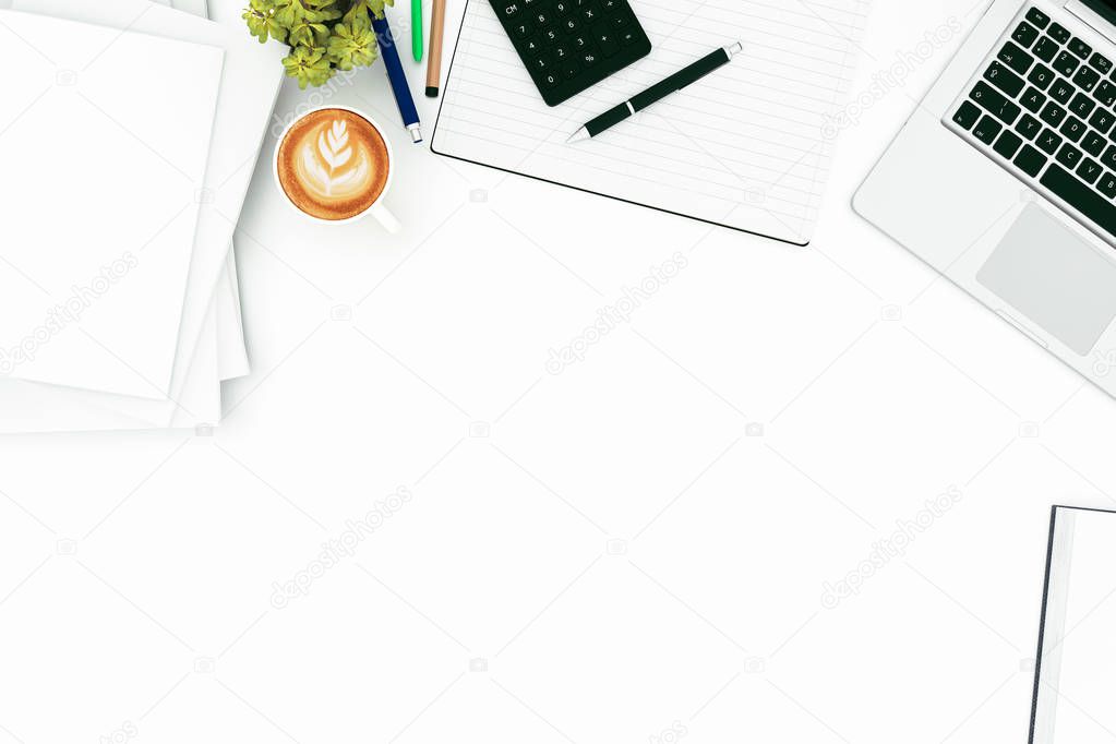 Office desk table with labtop computer,blank magazinesmart phone and coffee cup. Top view with copy space,3D rendering