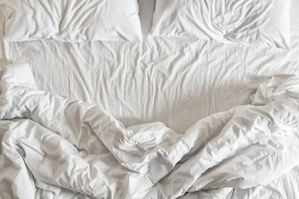 Top view of bedding sheets and pillow — Stock Photo, Image