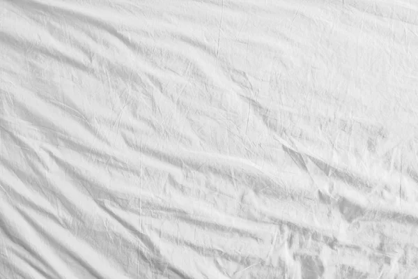 Top view of bedding sheets or white fabric wrinkle texture background — Stock Photo, Image