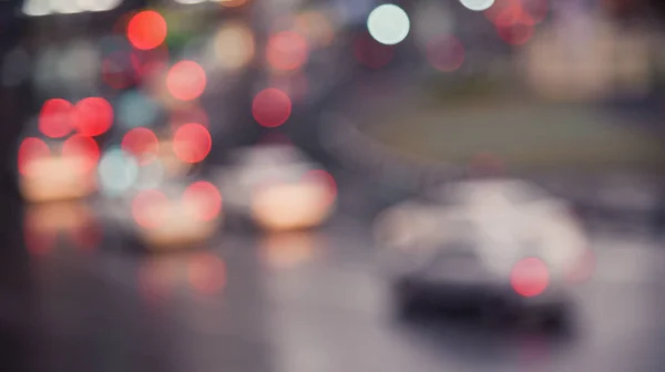 Абстрактный боке свет фон от дороги — стоковое фото