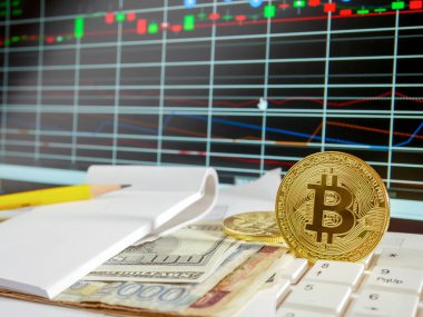 Banknot ve hisse senedi grafiği arka plan ile kripto para birimi için kavramsal altın bitcoin