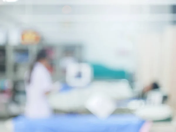 Verschwommene Krankenhaus-Hintergrund-abstrakte Unschärfe Ärzte und Krankenschwestern sind mit der Behandlung vieler kranker Menschen in Notfällen oder im Patientenzimmer für Hintergrund beschäftigt — Stockfoto