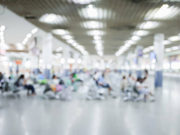Blurred People are Sitting in the waiting hall ,To wait for service use us waiting time management in service operations background