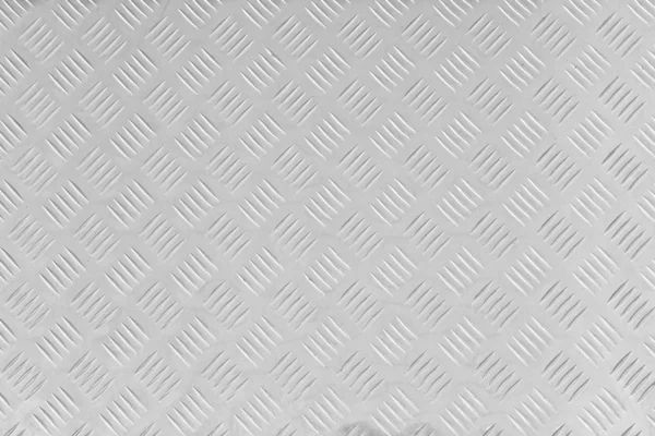 Texture de la plaque de plancher en acier inoxydable, feuille métallique avec des motifs rugueux. Modèle de carrés dénudés — Photo