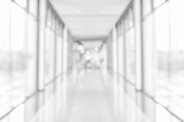 Arka plan tasarımları için Perspektif Binası Koridorundan Bulanık Boş Koridor Geçidi Arkaplanı