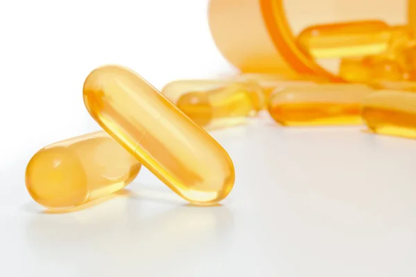 Fish Oil Capsules Yellow Gold Medicine Capsule Isolated White Background — Stock Photo, Image