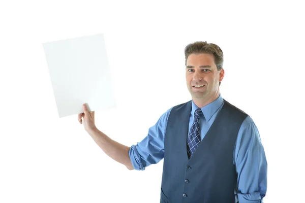 Деловой человек держит белую карточку. — стоковое фото
