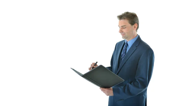 Hombre de negocios escribiendo en cartera Fotos de stock libres de derechos