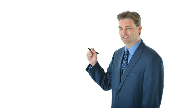 Бізнесмен тримає ручку Ліцензійні Стокові Зображення