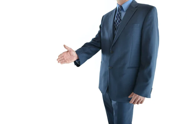 Homem de negócios ou de vendas apontando mão apresentando ou segurando a mão para aperto de mão — Fotografia de Stock