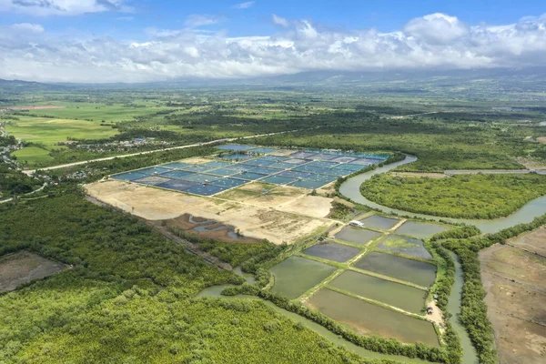 Aerial of a commercial fish farm near Ormoc, Leyte, Philippines. Example of Pisciculture