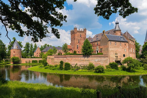 S 'HEERENBERG, GELDERLAND / THE NETHERLANDS - JUNI 4,2016: View of the historical castle Haus Berg in a sunny summer day
