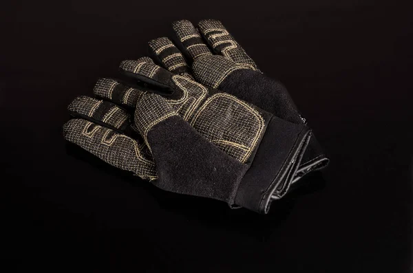 Leather work gloves on background