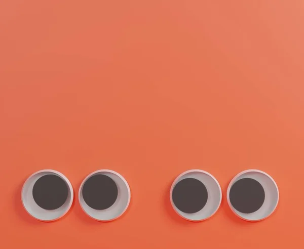 Googly μάτια με κενό χώρο για mock up με πορτοκαλί φόντο. — Φωτογραφία Αρχείου