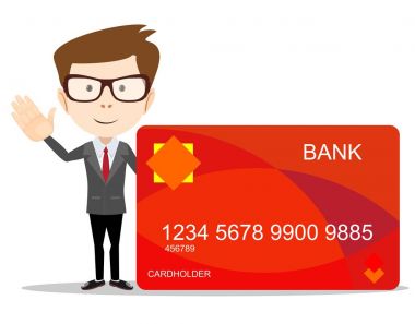 Takım elbiseli adam plastik kart gösterir.