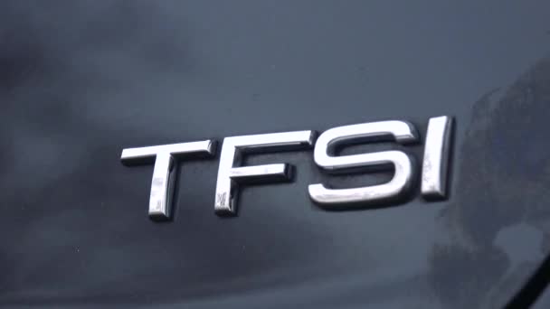 Closeup on TFSI written on a car — Stock Video