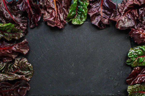 chard, Salad leaves (juicy snack and vitamins red chard,) menu concept. food background. top view. copy space