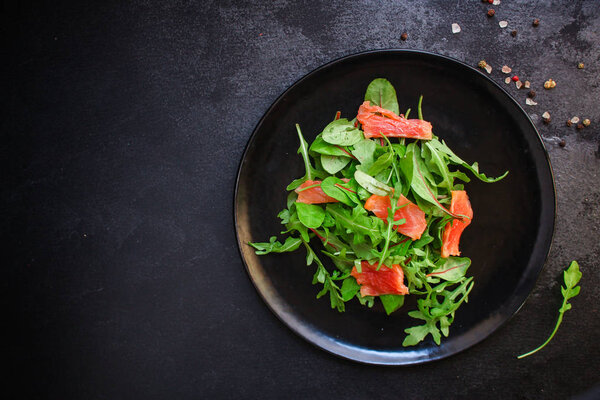  healthy salad leaves mix, salmon or tuna (delicious snack) menu concept. food background. top view. copy space
