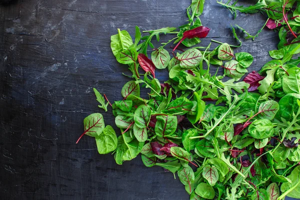 Healthy salad, leaves mix salad (mix micro greens, juicy snack). food background - copy space