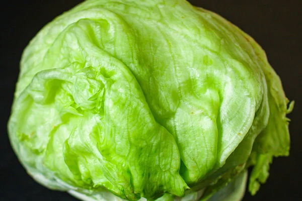 iceberg leaves lettuce green freshness. Menu concept food background, keto or paleo diet. top view. copy space for text