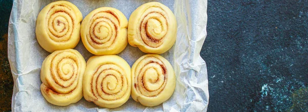 cinnamon bun roll home baked goods Menu concept healthy food background top view copy space