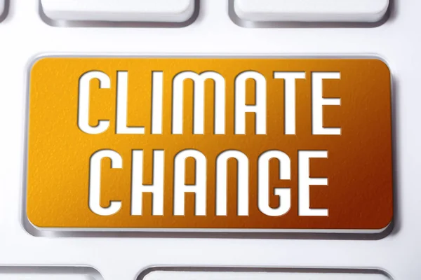 Orange Climate Change Button On A White Keyboard, Fragile Future Concept — Stock Photo, Image