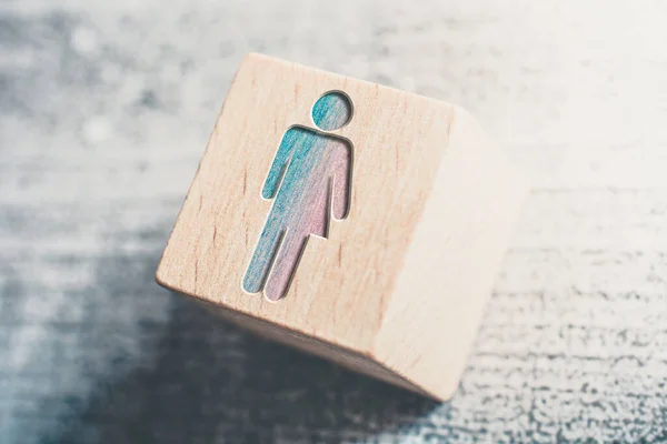 Combined Gender Signs For Male And Female On A Wooden Block On A Table — Stock Photo, Image