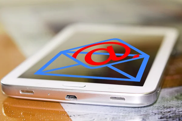 Email symbol on screen of cell phone . — Stock Photo, Image