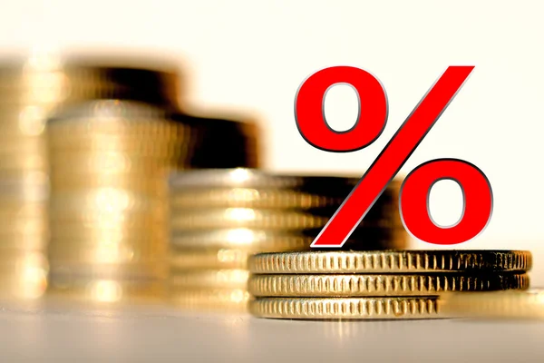 Red percent sign on a background of money . — Stock Photo, Image