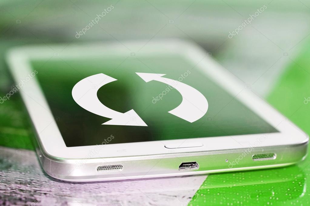 The arrows on the cell phone screen . The concept of updating web pages .