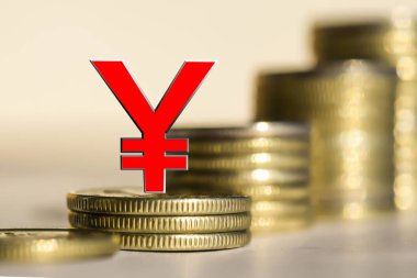 Arka planda barlar sikkelerin yuan sembolü .