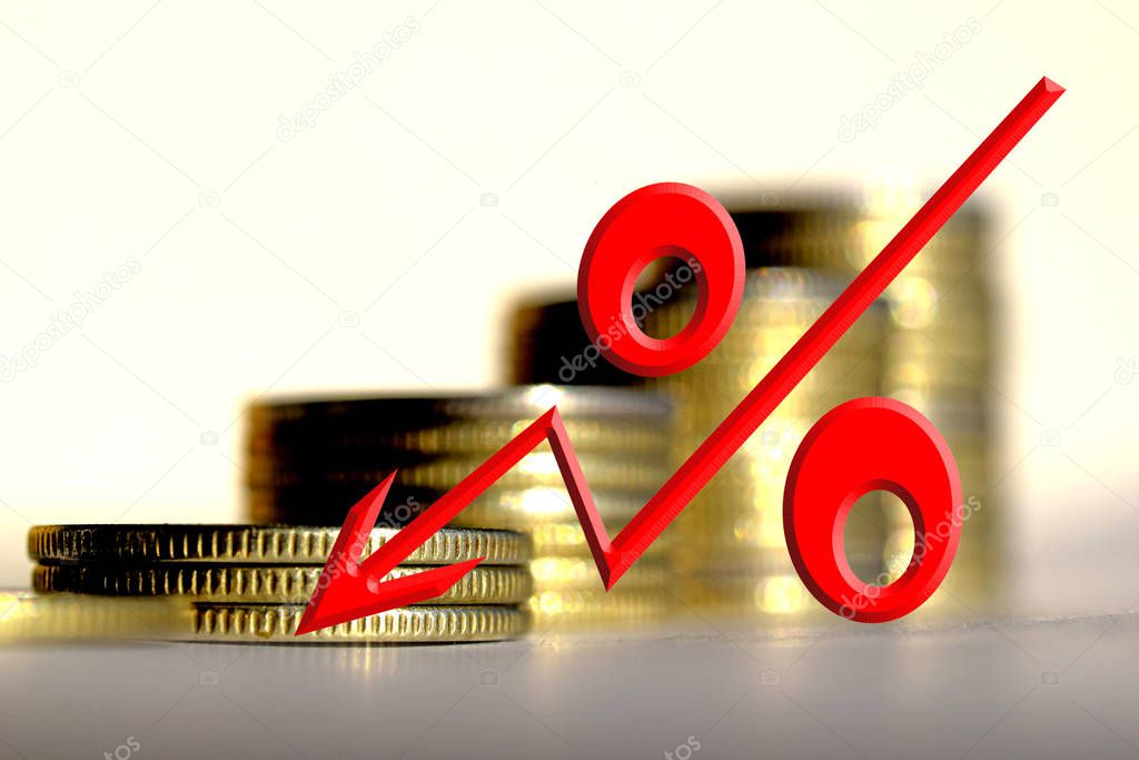 Red percent sign on a background of money . 