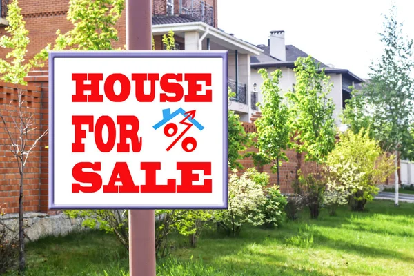 A Billboard advertising the sale of real estate .