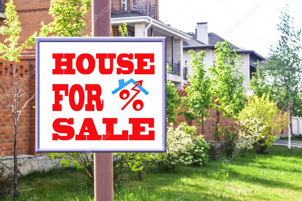 A Billboard advertising the sale of real estate . 