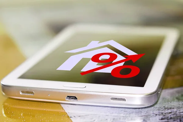 Red percentage sign and house on your phone screen — Stock Photo, Image