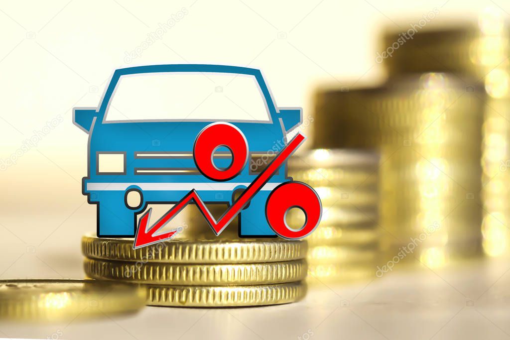 Passenger car and red percent sign on a background of money . 