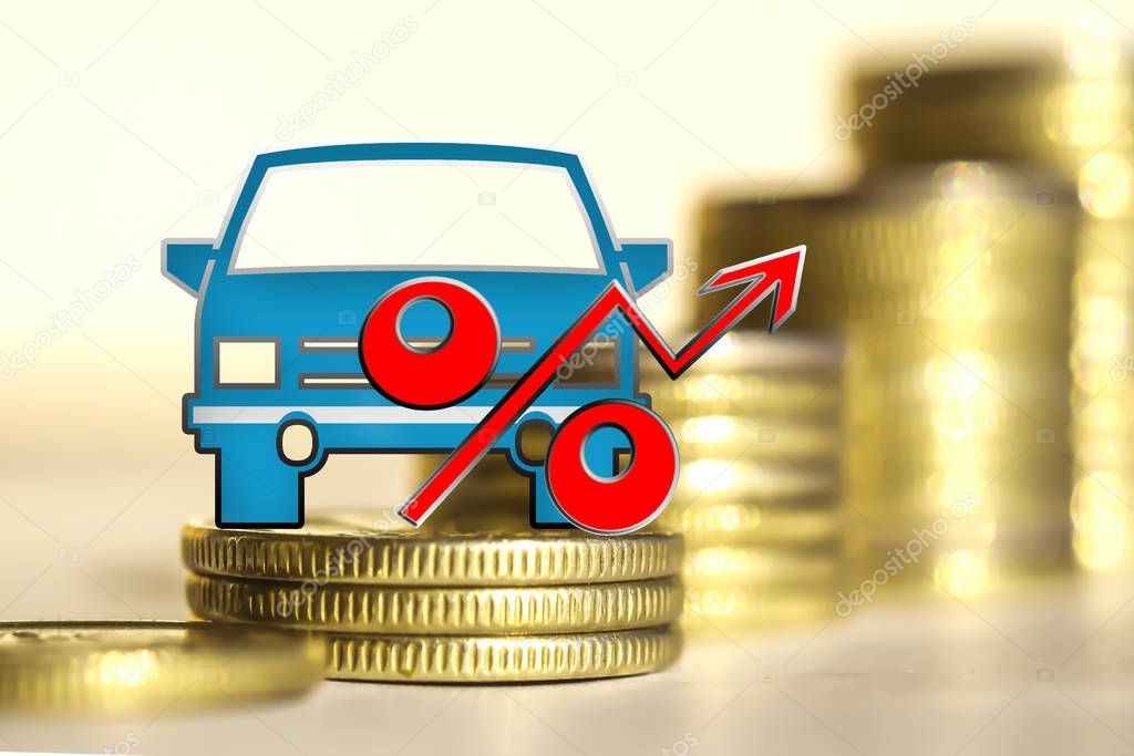 Passenger car and red percent sign on a background of money . 